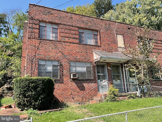 view of front facade featuring cooling unit