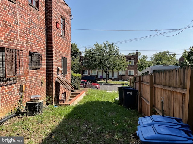 view of yard with central AC unit