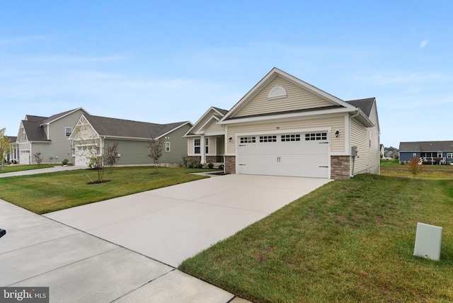 view of front of house featuring a garage and a front lawn