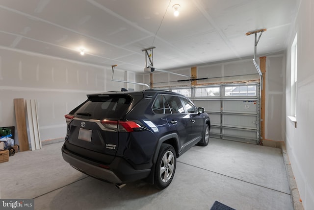 garage featuring a garage door opener