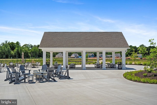 view of property's community featuring a patio area and a gazebo