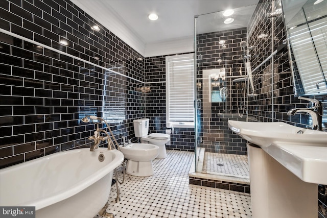 bathroom with toilet, independent shower and bath, a bidet, and tile walls