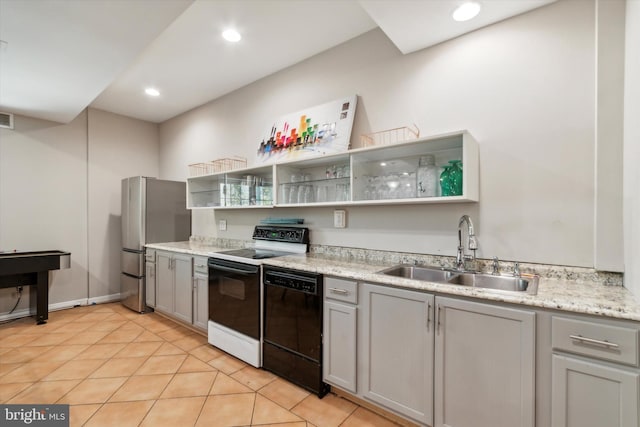 kitchen with stainless steel fridge, black dishwasher, electric stove, gray cabinets, and sink