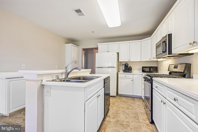 kitchen with an island with sink, sink, white cabinetry, and black appliances