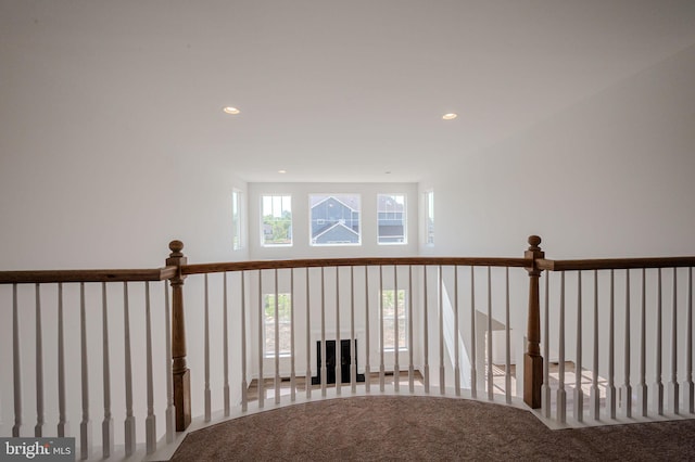 hallway featuring carpet floors and recessed lighting