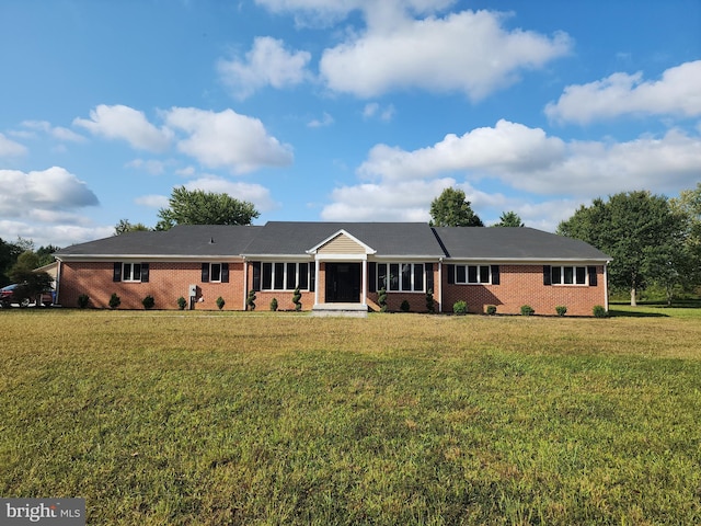 ranch-style house with a front yard