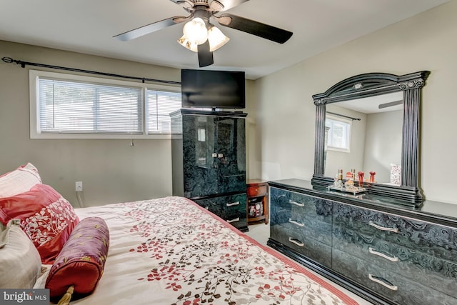 bedroom featuring ceiling fan