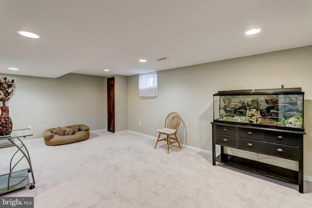 sitting room with light carpet