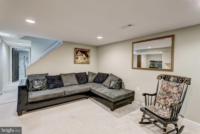 living room with light colored carpet