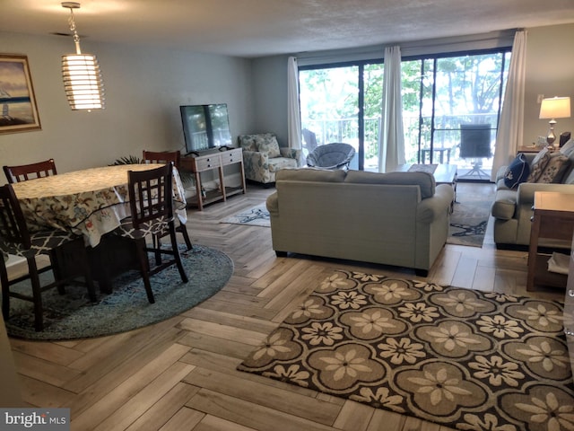 living room featuring light parquet floors