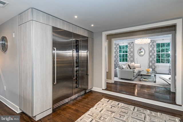 kitchen featuring dark hardwood / wood-style floors and a healthy amount of sunlight