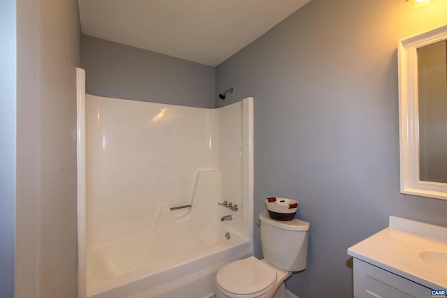 full bathroom featuring shower / bathtub combination, vanity, and toilet