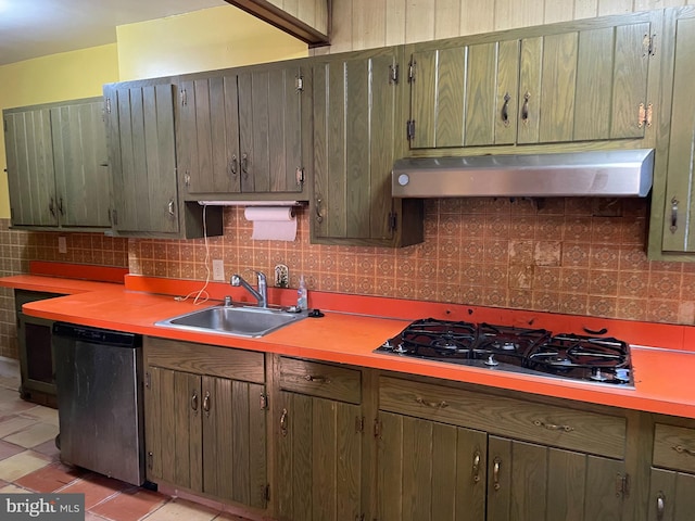 kitchen featuring sink, dishwasher, backsplash, black gas cooktop, and light tile patterned floors