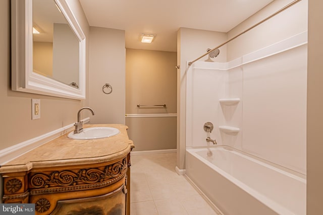 bathroom with shower / tub combination, vanity, and tile patterned flooring