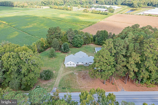 birds eye view of property featuring a rural view