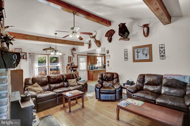 650 Bucks Church Rd, Newport, PA 17074 - living room featuring beamed ceiling, ceiling fan, and light wood finished floors
