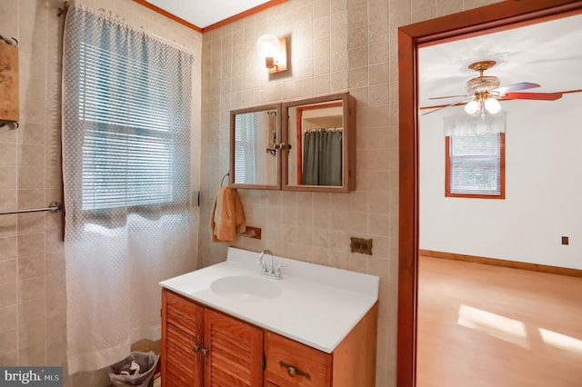 650 Bucks Church Rd, Newport, PA 17074 - full bath featuring tile walls, a ceiling fan, vanity, crown molding, and a shower with shower curtain