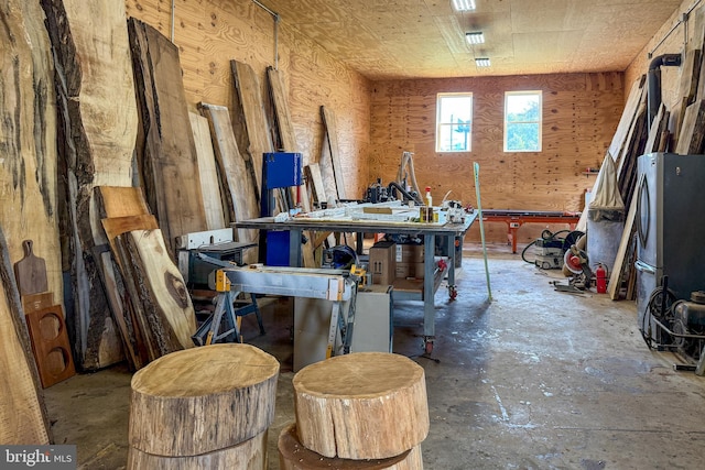 miscellaneous room featuring a workshop area