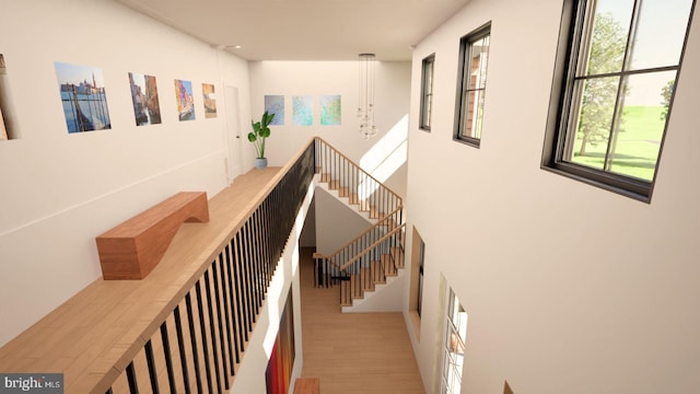 hallway with hardwood / wood-style flooring