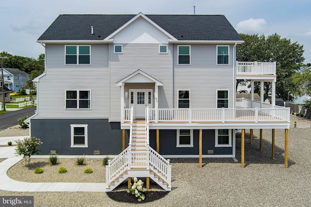 back of house featuring french doors