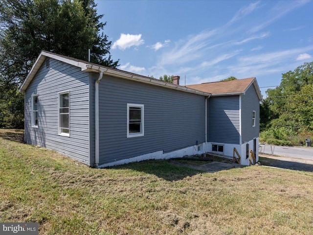 exterior space featuring a yard