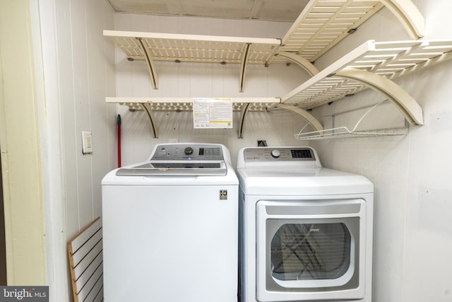 laundry area with washer and dryer