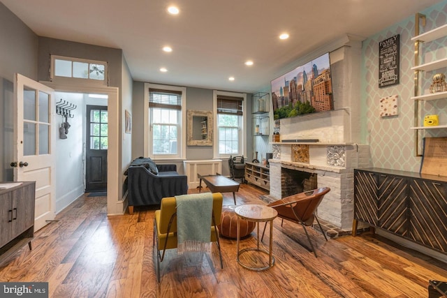 dining space featuring hardwood / wood-style flooring and a healthy amount of sunlight