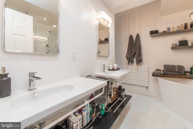 bathroom with vanity, independent shower and bath, and tile patterned floors