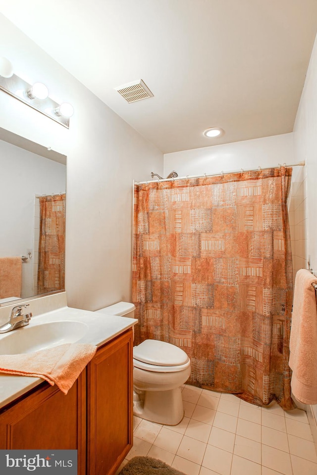 bathroom featuring tile patterned flooring, vanity, toilet, and a shower with shower curtain