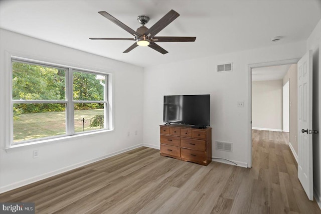 unfurnished bedroom featuring ceiling fan and light wood-type flooring