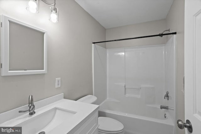 full bathroom with vanity, toilet, and shower / bathtub combination