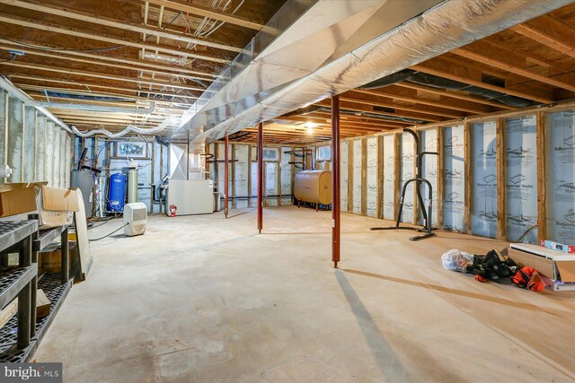 empty room featuring ceiling fan and light hardwood / wood-style flooring