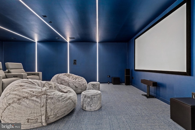 cinema room featuring carpet floors