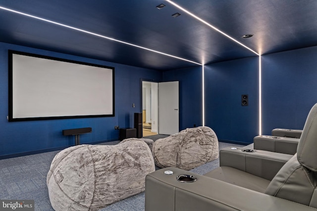 cinema room featuring carpet