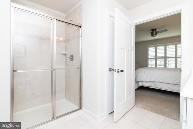 bathroom featuring an enclosed shower, tile patterned floors, and ceiling fan