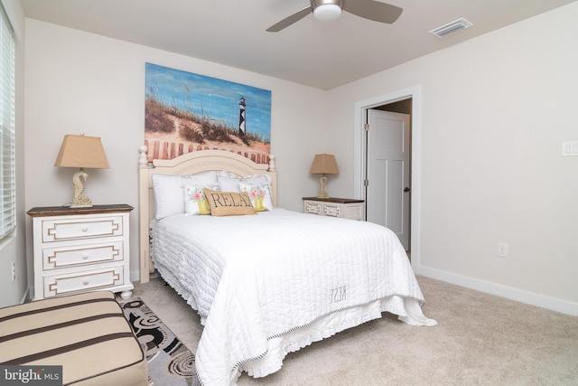 carpeted bedroom with ceiling fan