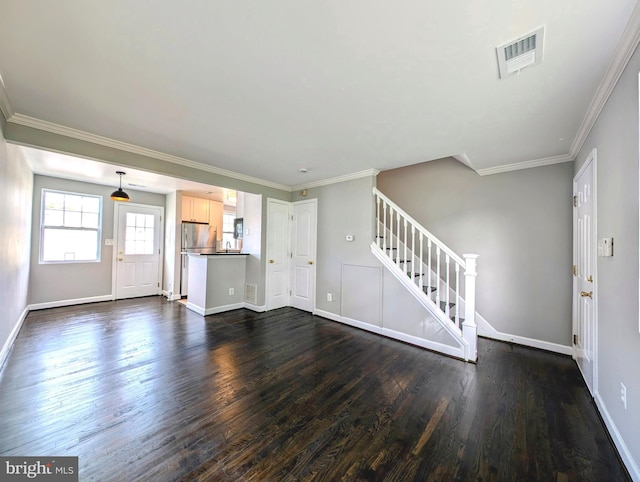 unfurnished living room featuring dark wood-style floors, visible vents, baseboards, and stairway