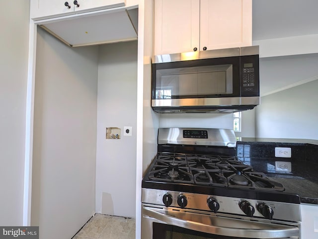 kitchen featuring white cabinetry and stainless steel appliances
