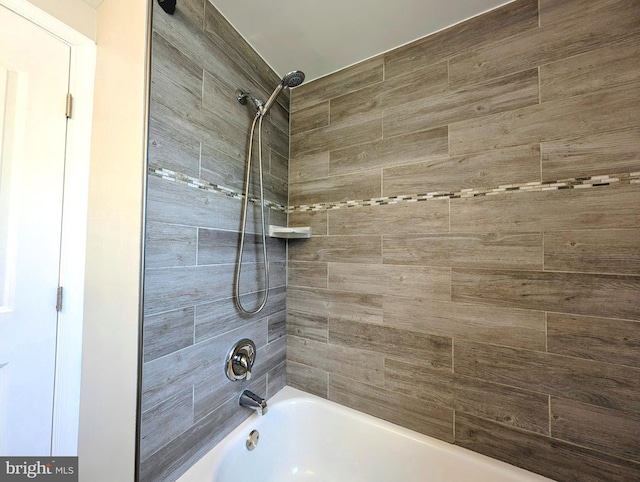 bathroom with washtub / shower combination