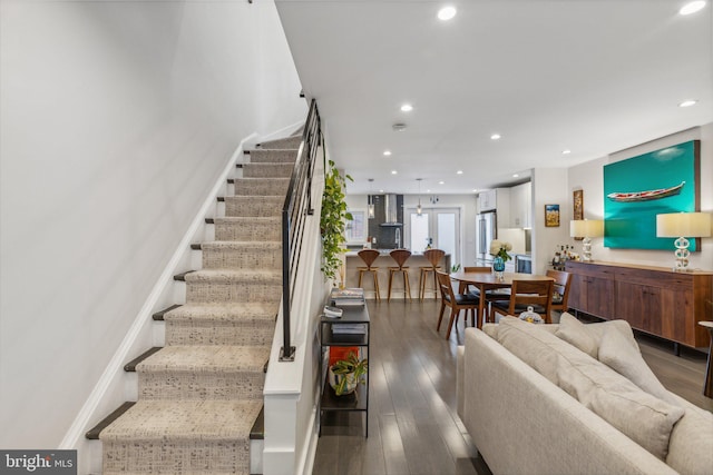 living room featuring dark hardwood / wood-style floors