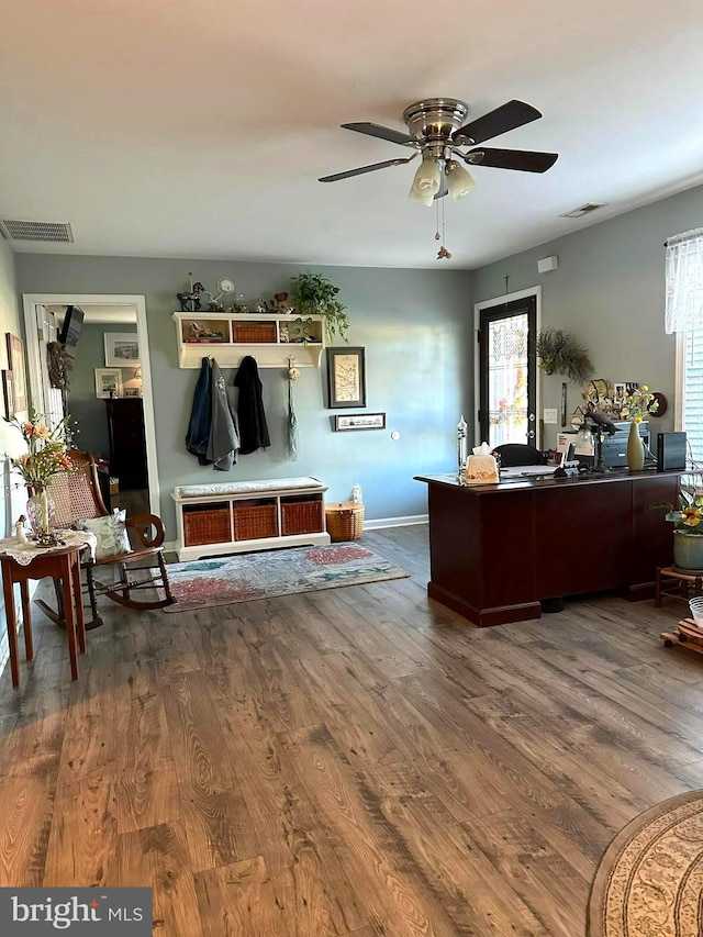 office area with wood-type flooring and ceiling fan