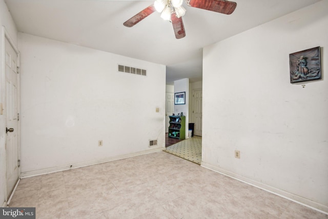 empty room featuring ceiling fan