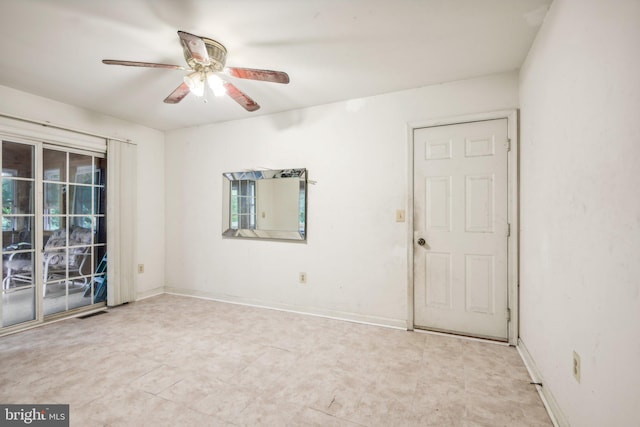 unfurnished room featuring ceiling fan