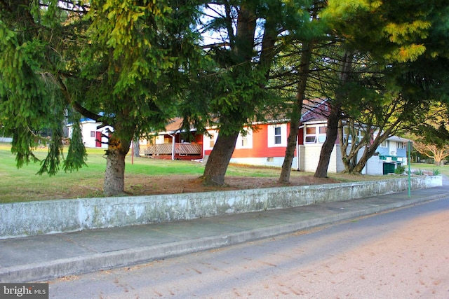 exterior space with a front lawn