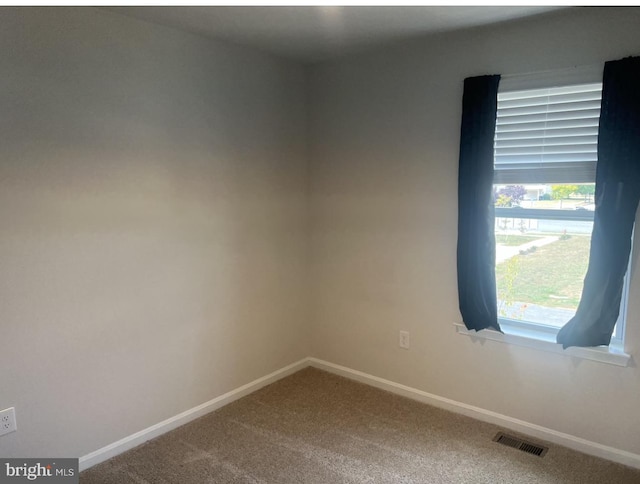 view of carpeted spare room