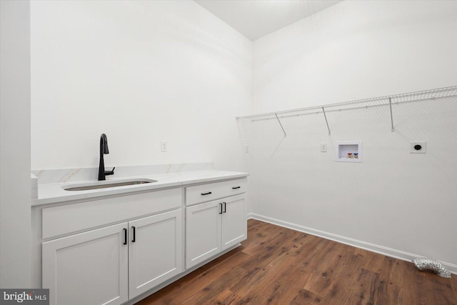 73 King Richard Rd, Berlin, MD 21811 - clothes washing area with a sink, electric dryer hookup, dark wood-style floors, cabinet space, and hookup for a washing machine