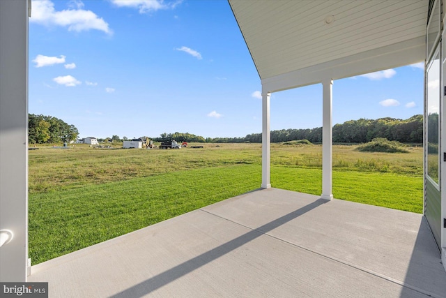 view of patio / terrace with a rural view