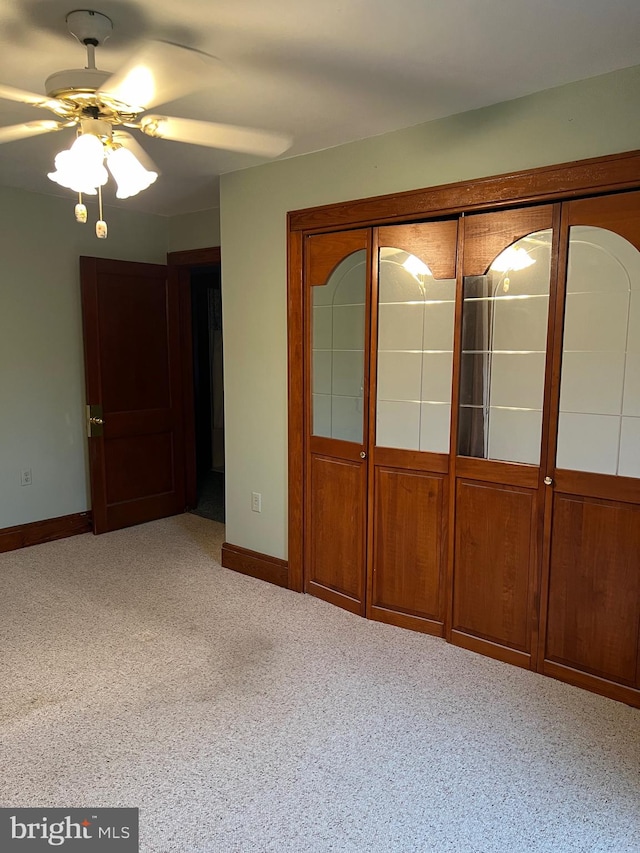 empty room featuring ceiling fan