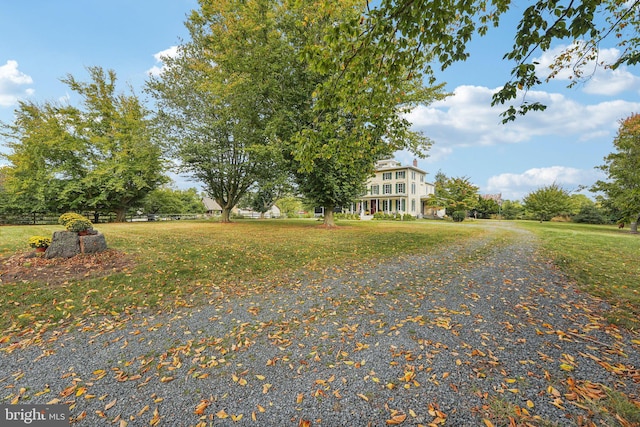 view of road with driveway