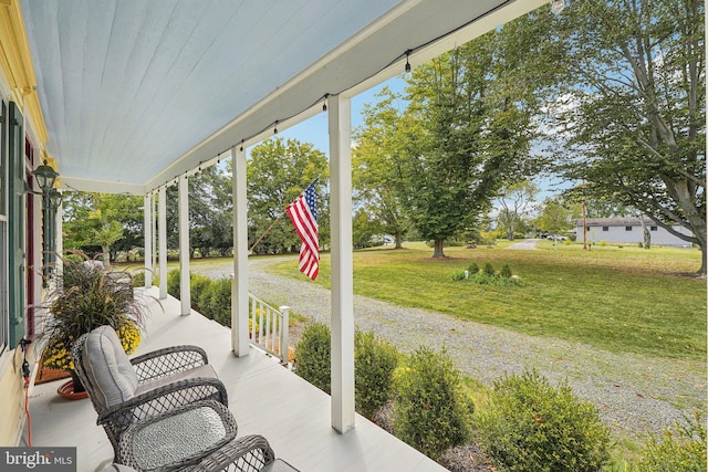 view of patio featuring a porch
